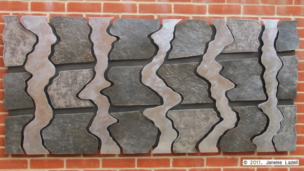 Sculpture-wall hanging in garden-view 2